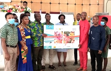Dr Arko Akoto Ampaw (2nd from right ), Medical Director of the Eastern Regional Hospital, presenting a brand new plasma television to Peter Sakite (3rd from left), House Master of the Manya Krobo SHS. Looking on are the students and management of the hospital. Dr Arko Akoto Ampaw (2nd from right ), Medical Director of the Eastern Regional Hospital, presenting a brand new plasma television to Peter Sakite (3rd from left), House Master of the Manya Krobo SHS. Looking on are the students and management of the hospital.